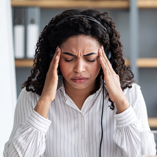 woman suffering a migraine